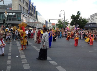 Ambassador Sarrath Kongahage walking along in the Parade